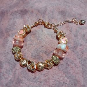 Rose gold snake chain charm bracelet with pink european beads and heart charm